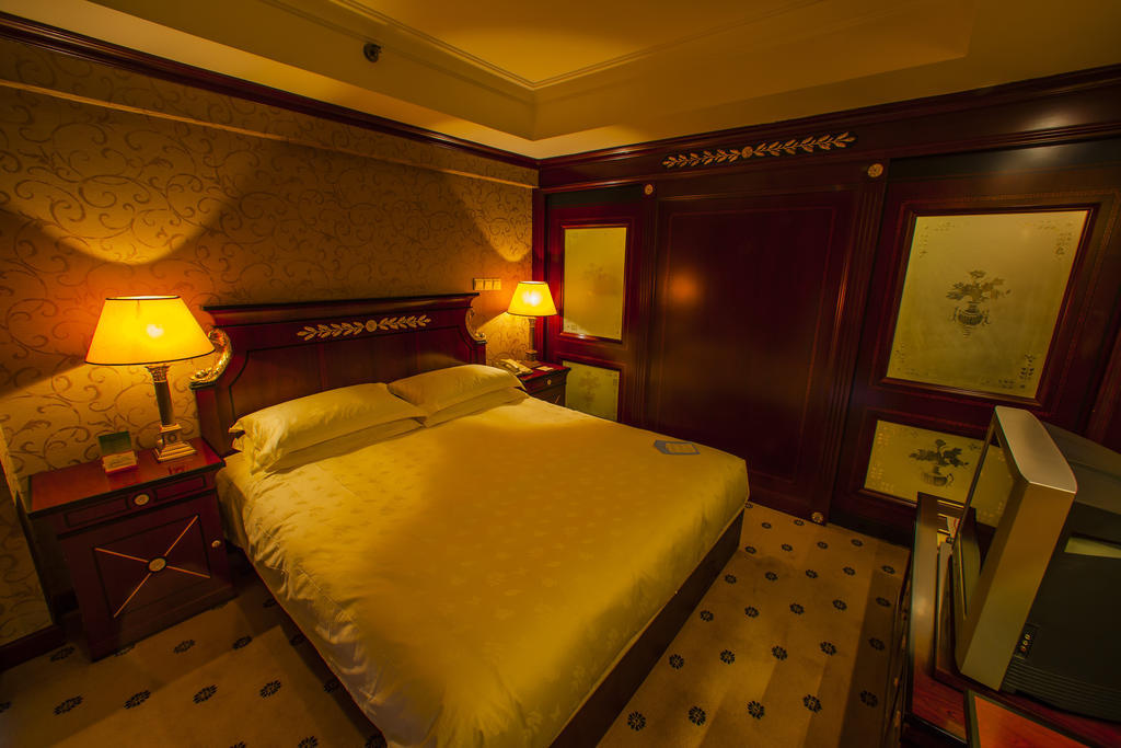 Salvo Hotel Shanghái Habitación foto